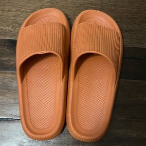 ORANGE PILLOW SLIDES